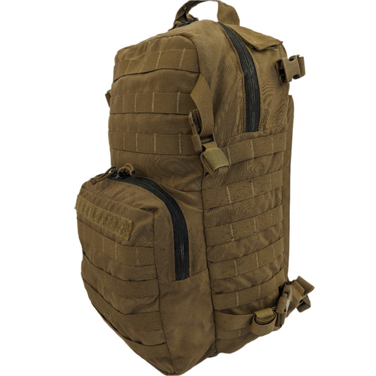 A coyote brown U.S. military surplus 3-day assault pack with multiple compartments.