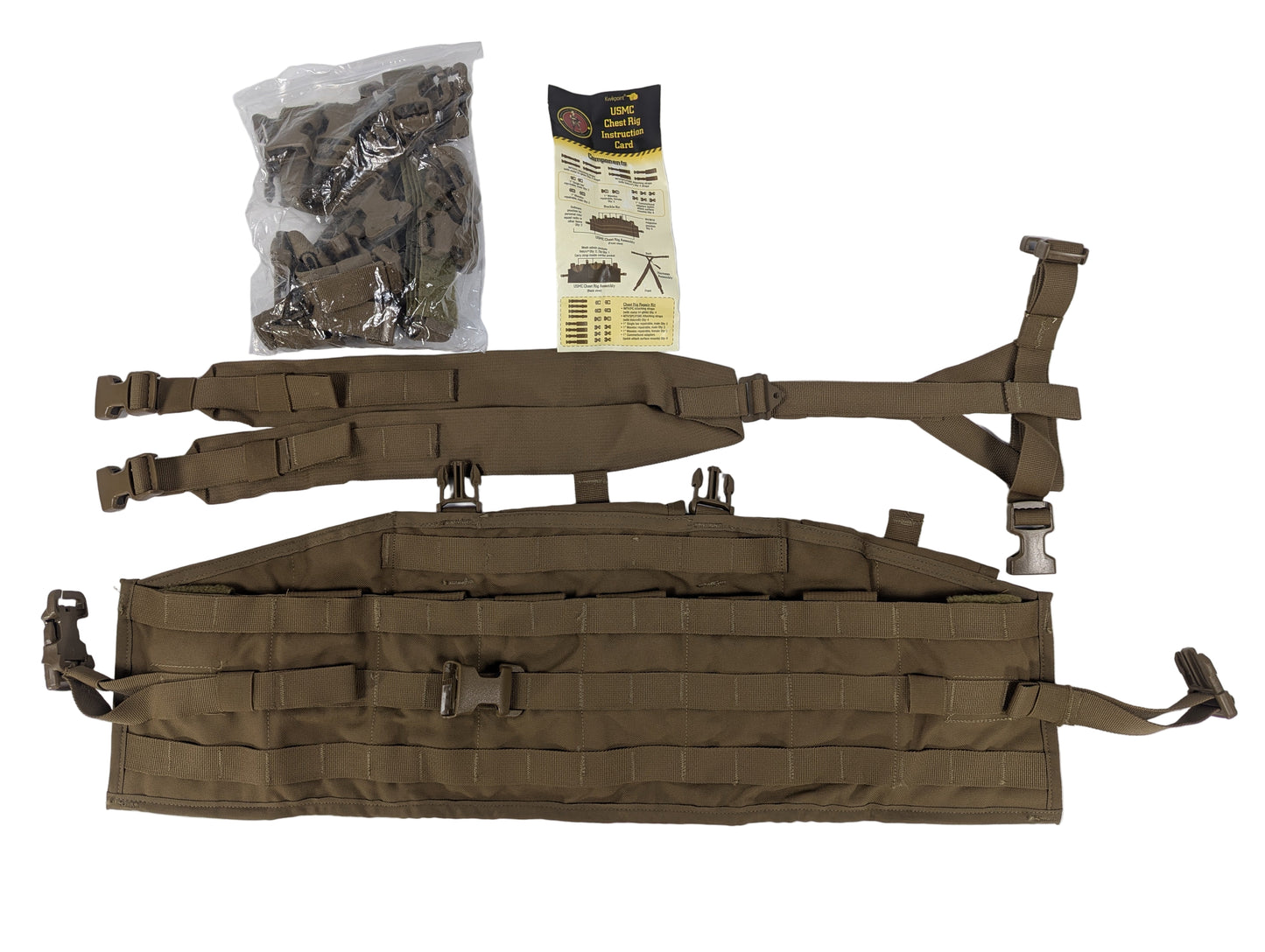 Brown tactical vest with straps and a package on a white background