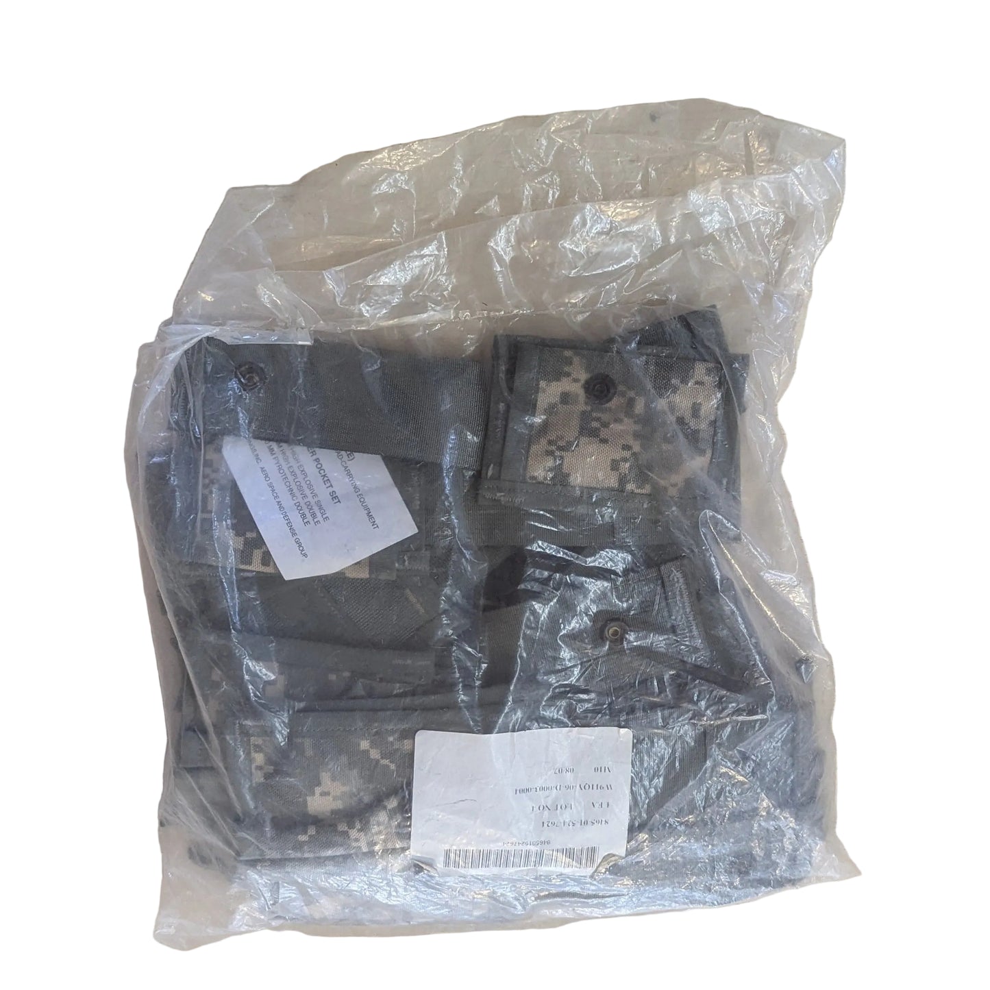 Packaged item on a beige surface with visible labels