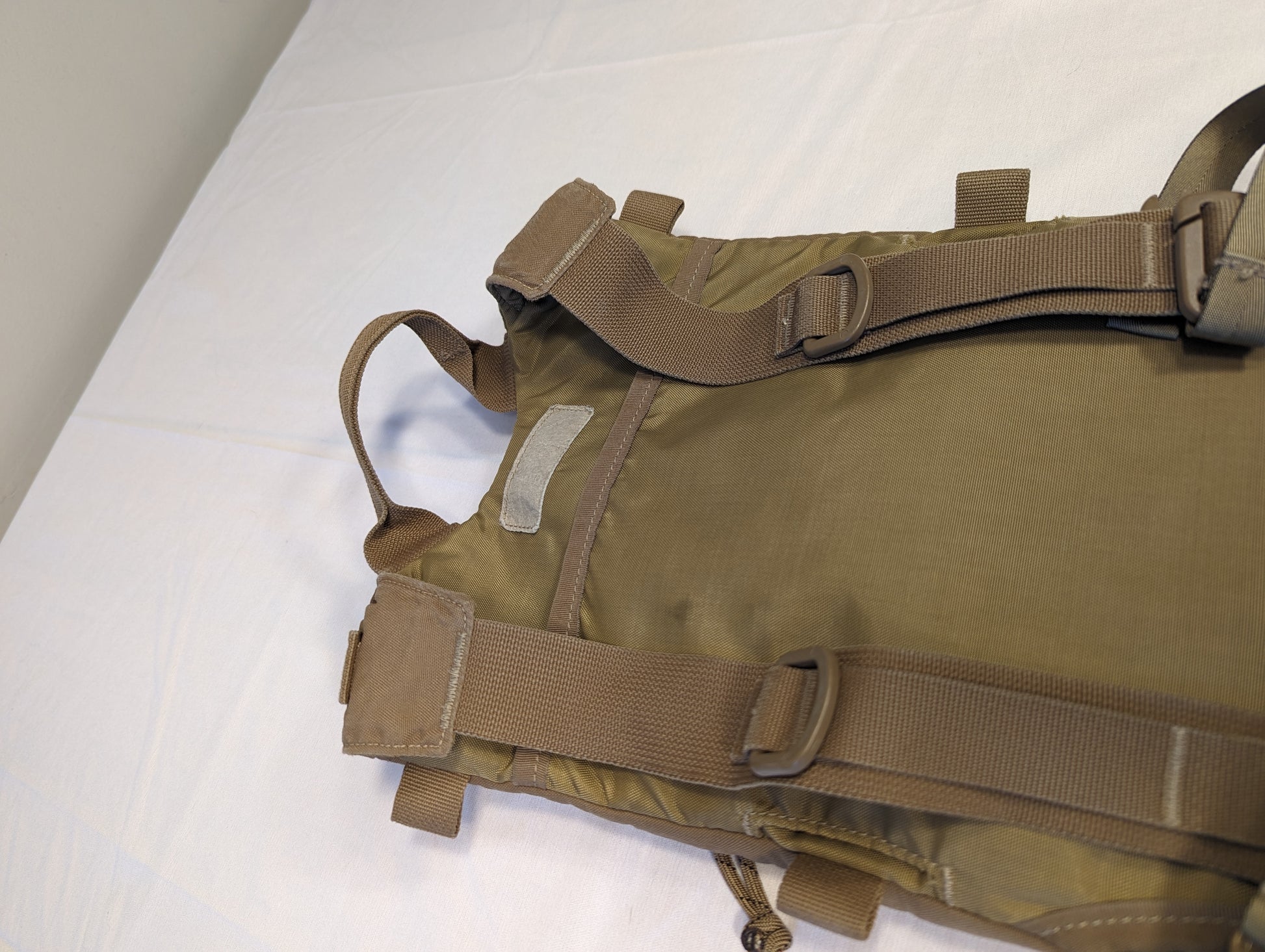 Brown tactical vest on a white background