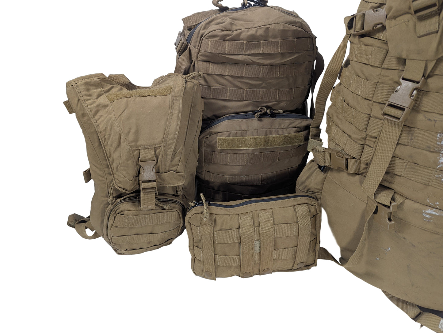 Set of tactical backpacks on a white surface 