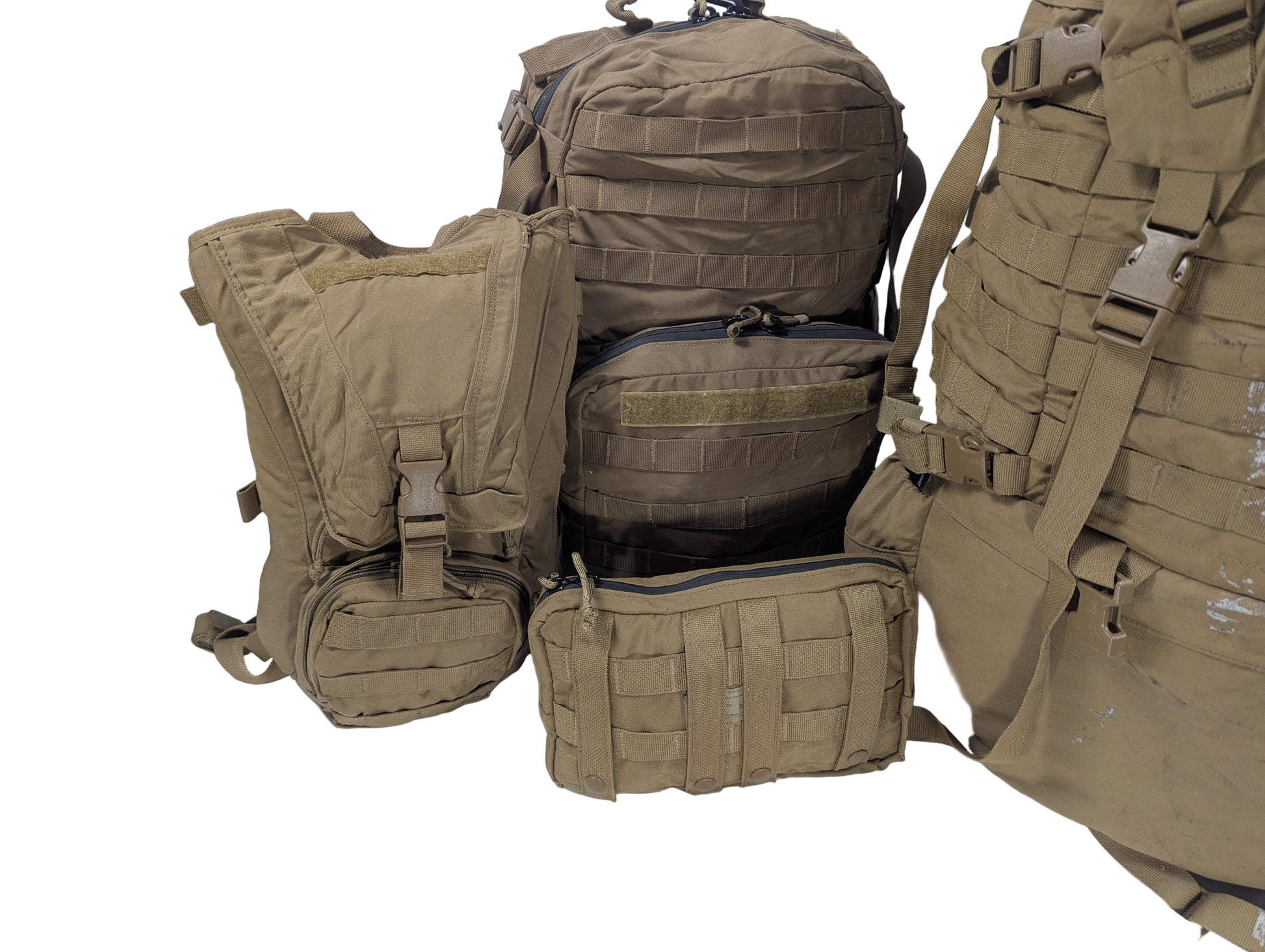 Set of tactical backpacks on a white surface 