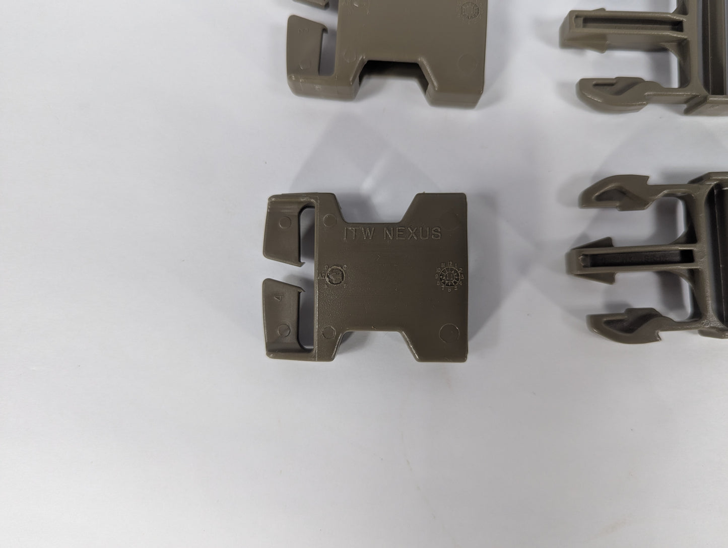 Metallic buckle and parts on a white background