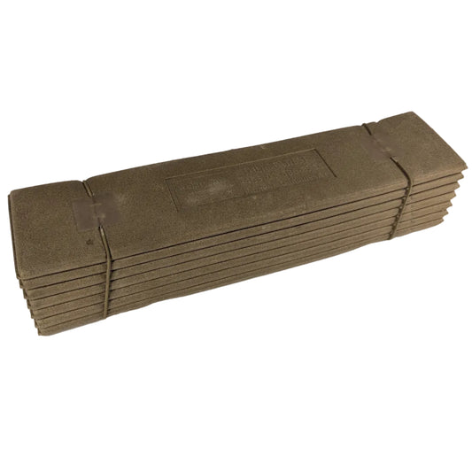 Stack of brown paper bags on a white surface with a gray background