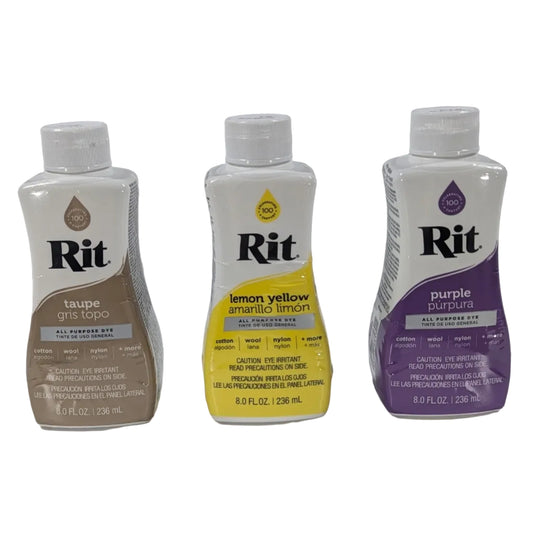 Three bottles of Rit dye on a white background