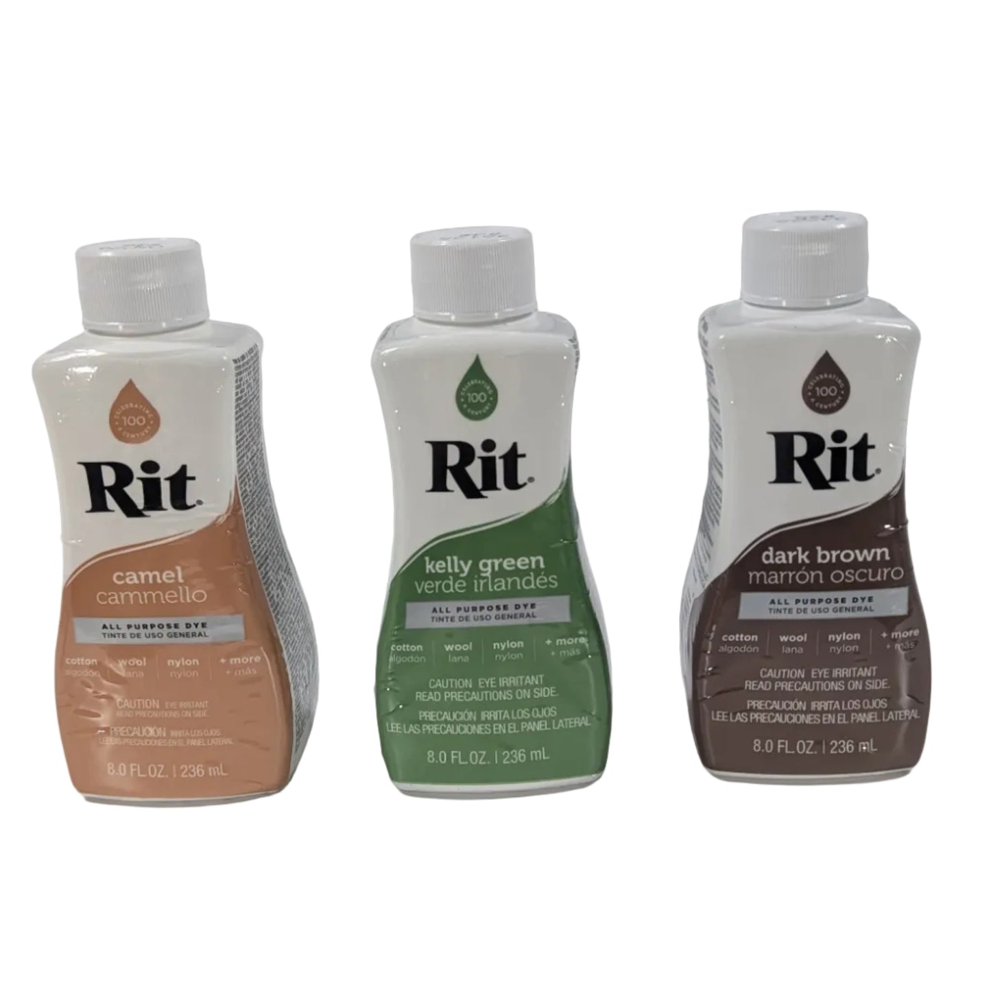 Three bottles of Rit dye on a white surface with a gray background