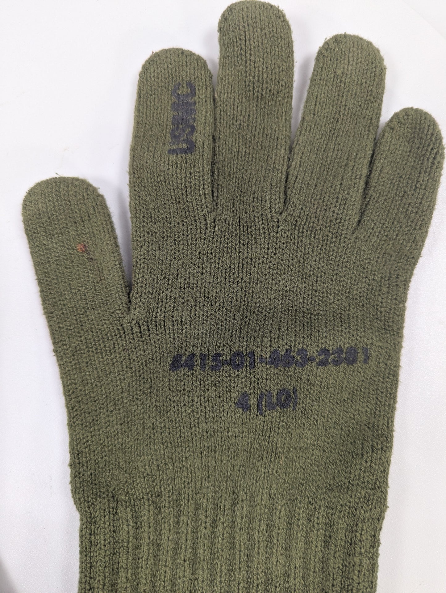 Green glove with text on a white background