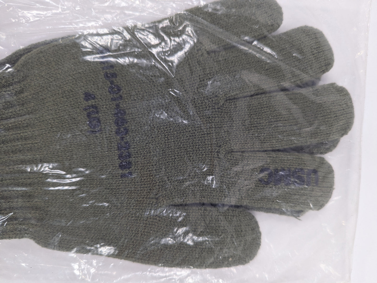 Pair of gray gloves with text on a white background