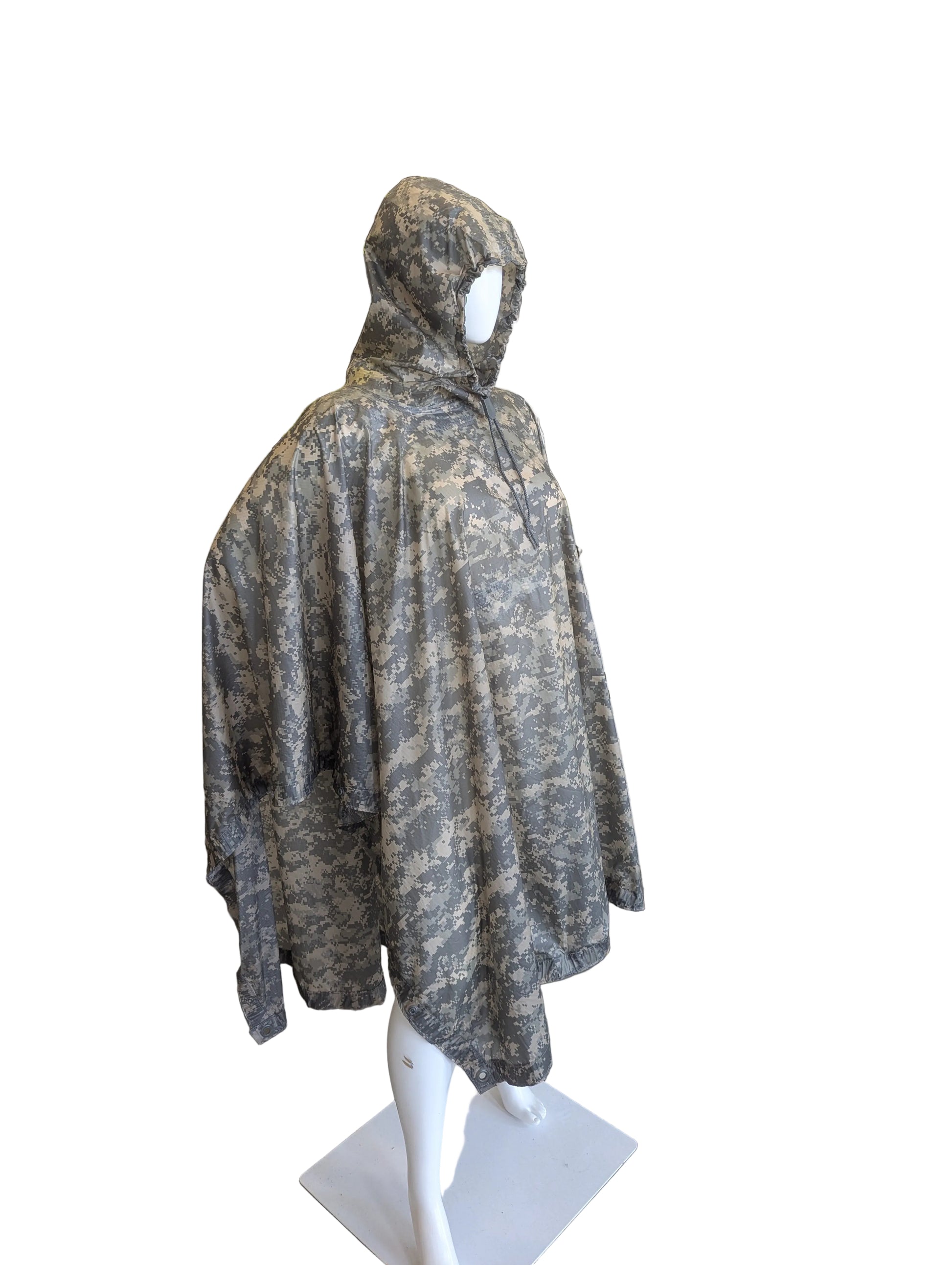 Camouflage poncho on a mannequin