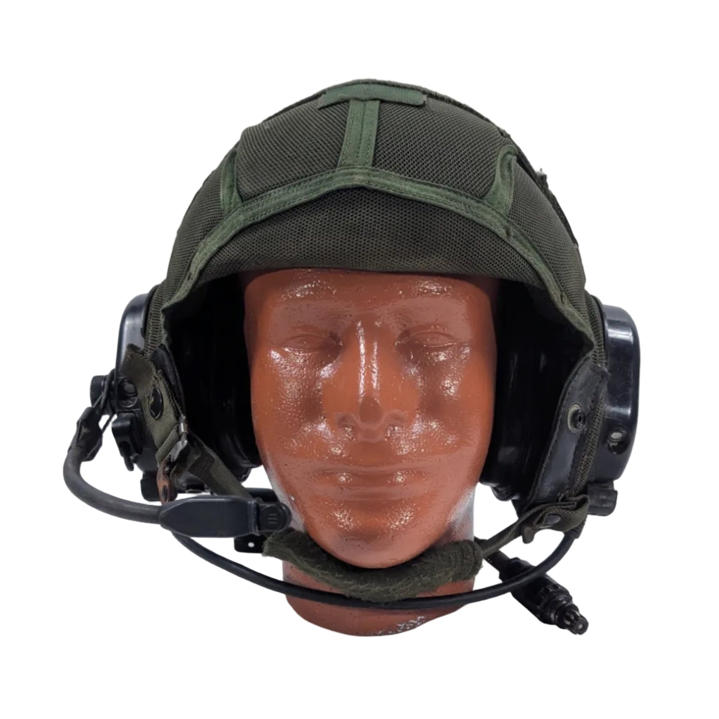 Green military helmet on a mannequin head against a white background