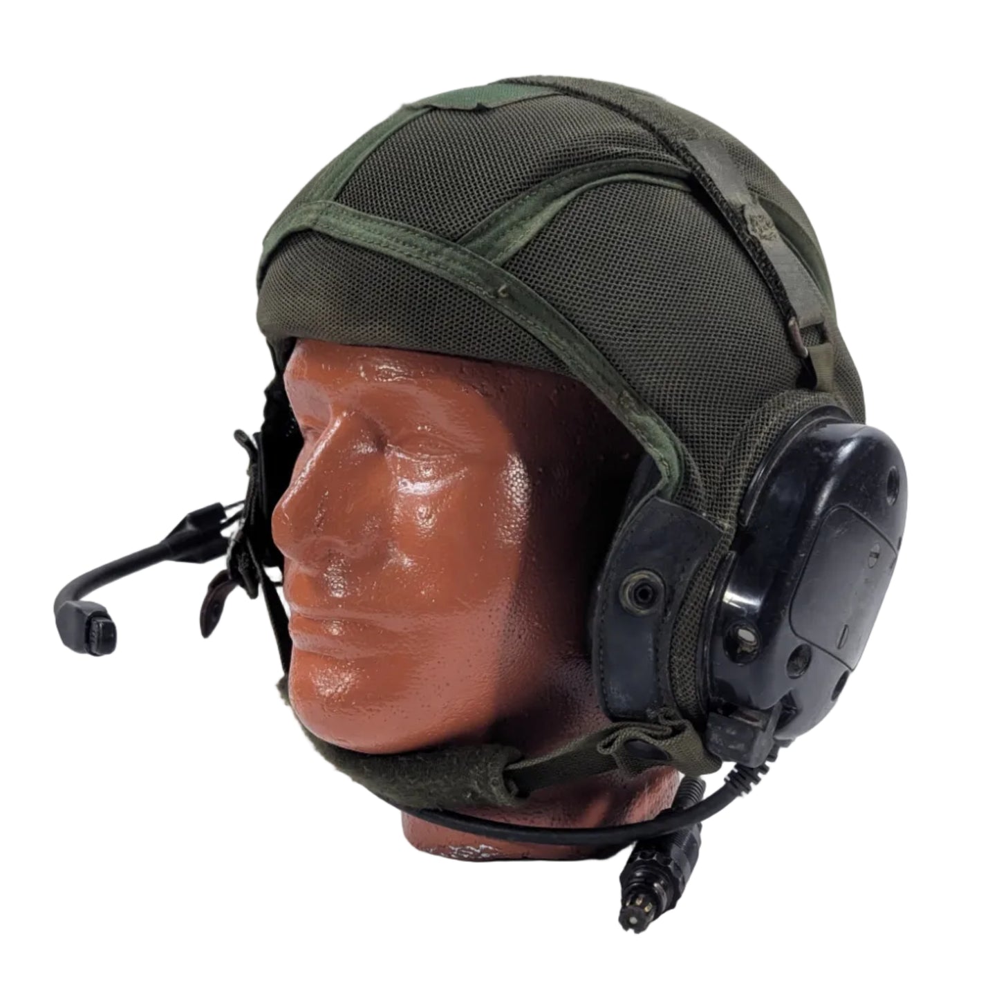 Green military helmet with communication headset on a white background