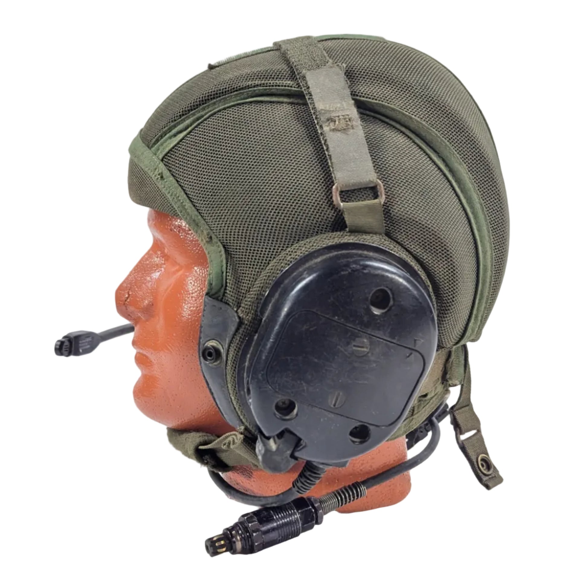 Green military helmet with communication headset on a white background
