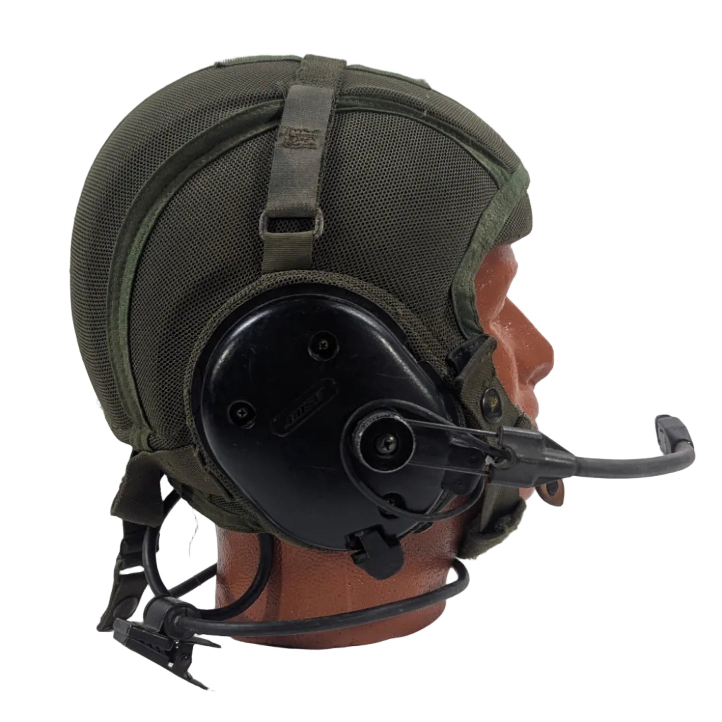 Green military helmet with communication device on a white background