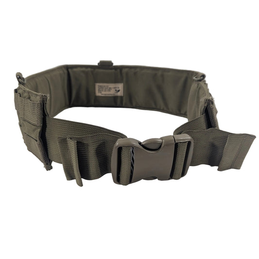 An olive drab tactical belt with a quick-release plastic buckle, displayed on a white circular stand against a white fabric backdrop.