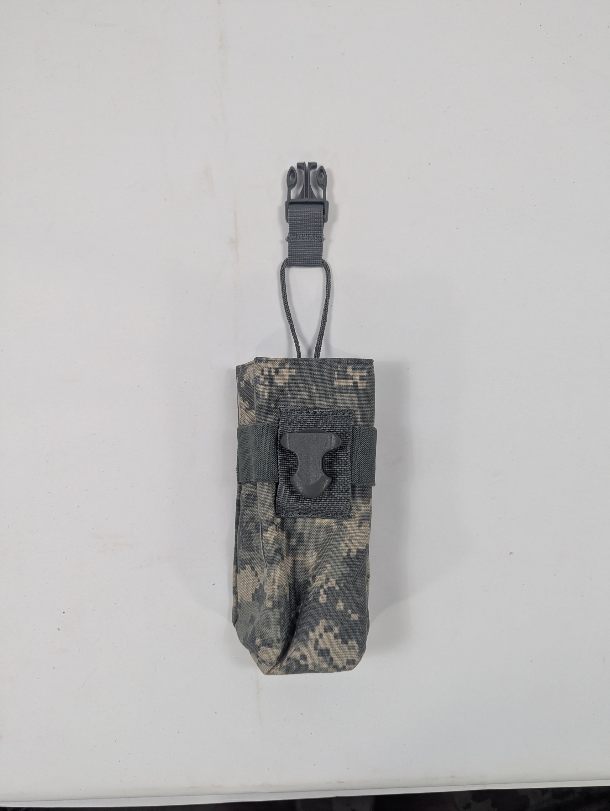 A digital camouflage utility pouch with a dark gray plastic clip and strap, shown against a plain off-white background.