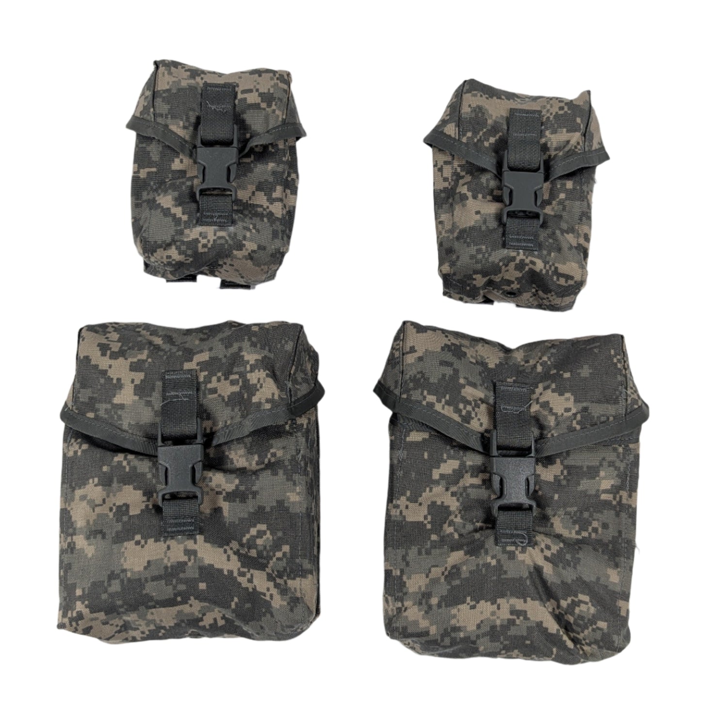 Four camouflage pouches on a white surface