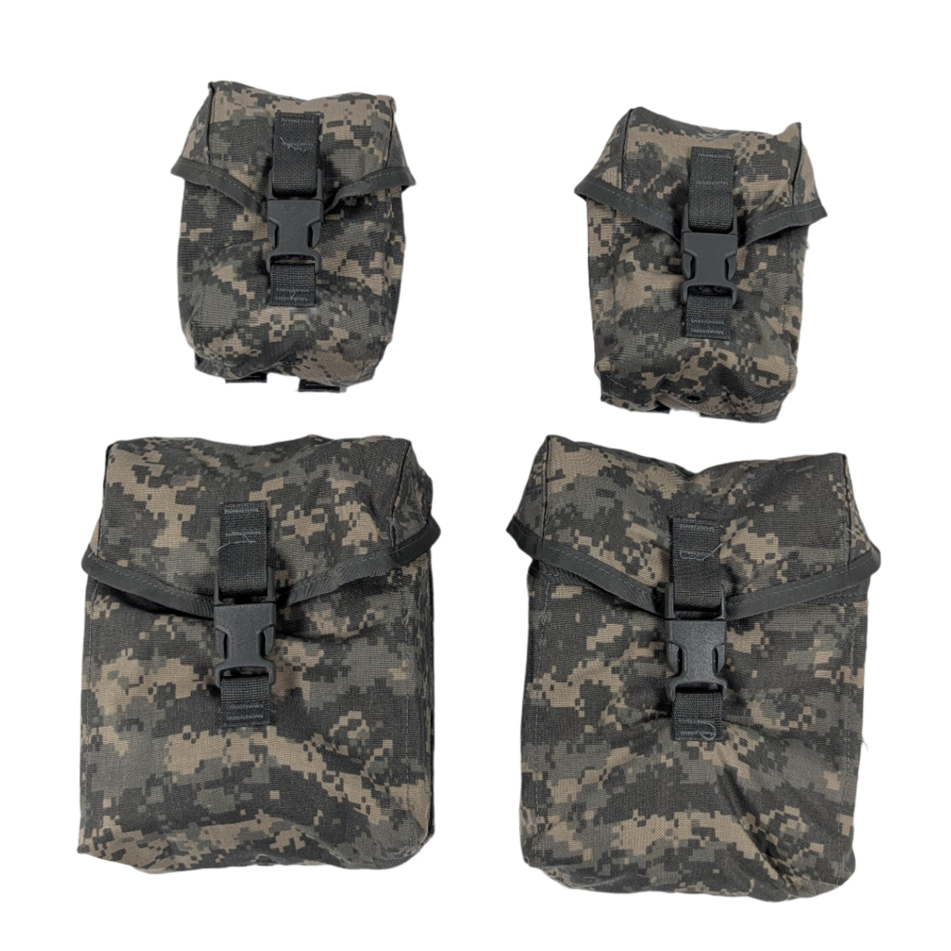Four camouflage pouches on a white surface
