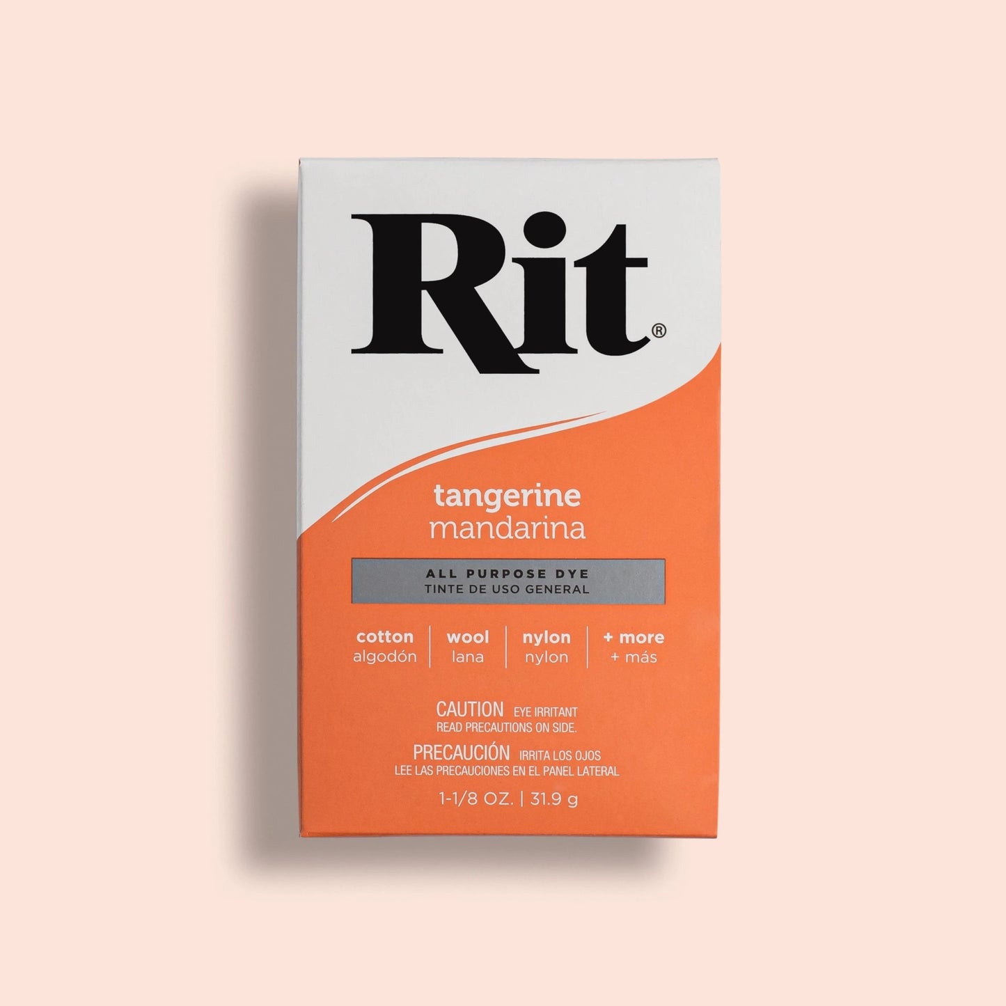 Rit dye box for tangerine color on a light pink background