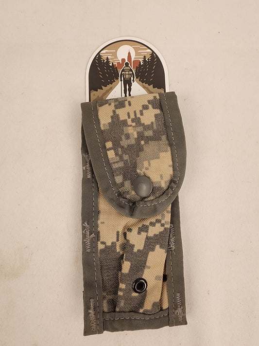 Genuine U.S. military surplus 9mm magazine pouch in UCP/ACU camouflage pattern.