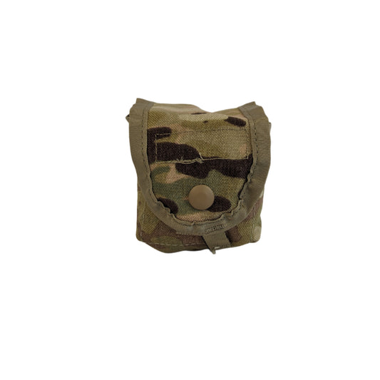 A studio shot of a single U.S. Military Surplus Hand Grenade Pouch (NSN 8465-01-580-0697) in OCP/Multicam camouflage, standing upright and closed on a clean white background.