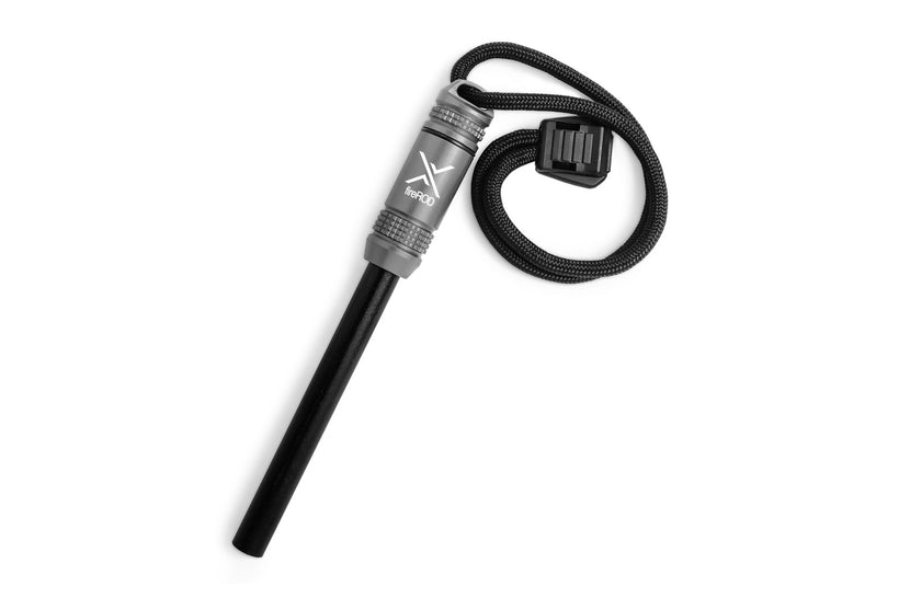 A silver/gunmetal fireROD fire starter lying diagonally on a white background, featuring a matching anodized aluminum handle, a black ferrocerium rod, and a black paracord lanyard.