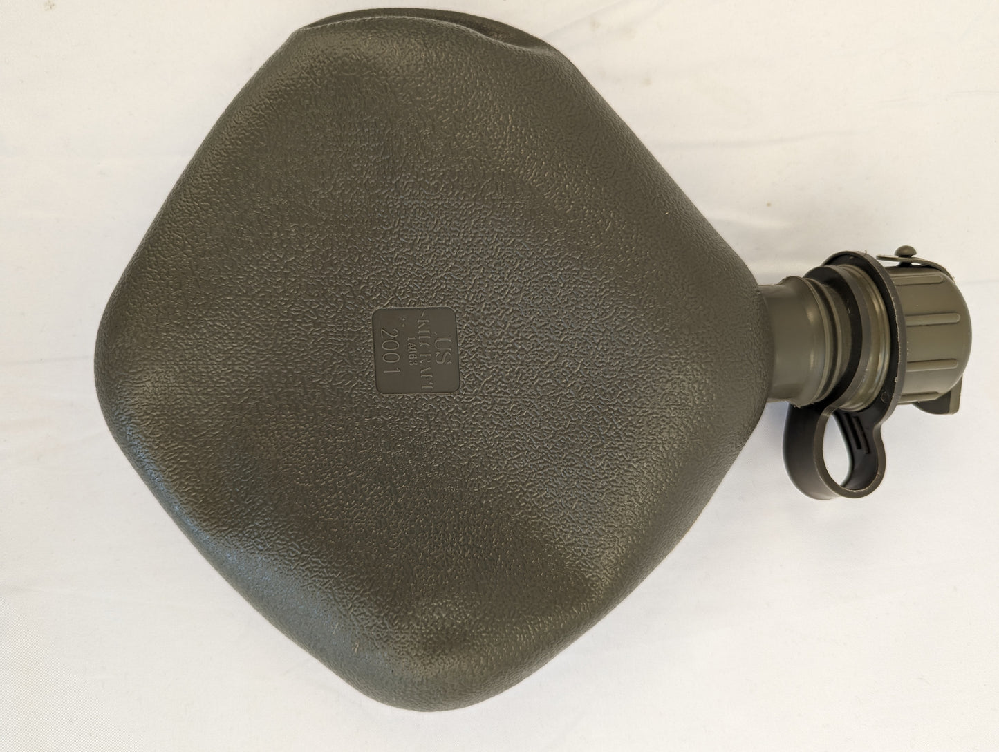 A close-up overhead view of a U.S. Military Surplus 2-quart collapsible water canteen in olive drab, displaying the textured body, rigid filler neck, and embossed 'US' and 'SKILCRAFT' markings.