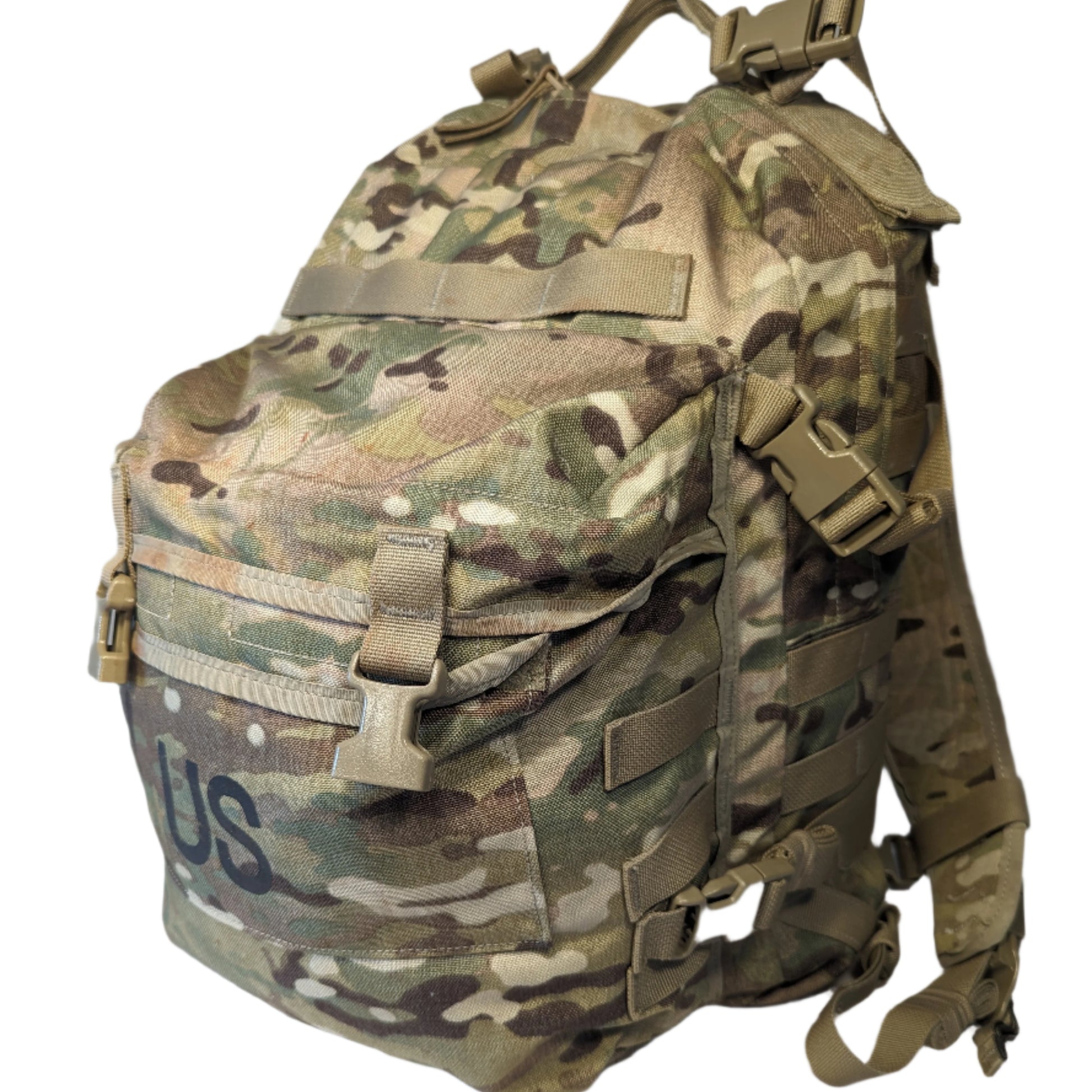A U.S. Military Surplus 3-Day Assault Pack in OCP/Multicam camouflage, featuring extensive MOLLE webbing, compression straps, and a large stenciled 'US' mark on the front pocket.