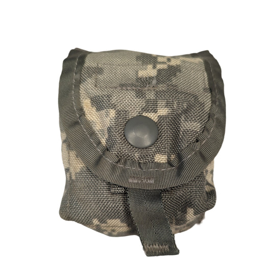 A single U.S. Military Surplus Hand Grenade Pouch in ACU digital camouflage, standing upright on a white background, featuring a snap-button flap closure and pull tab.