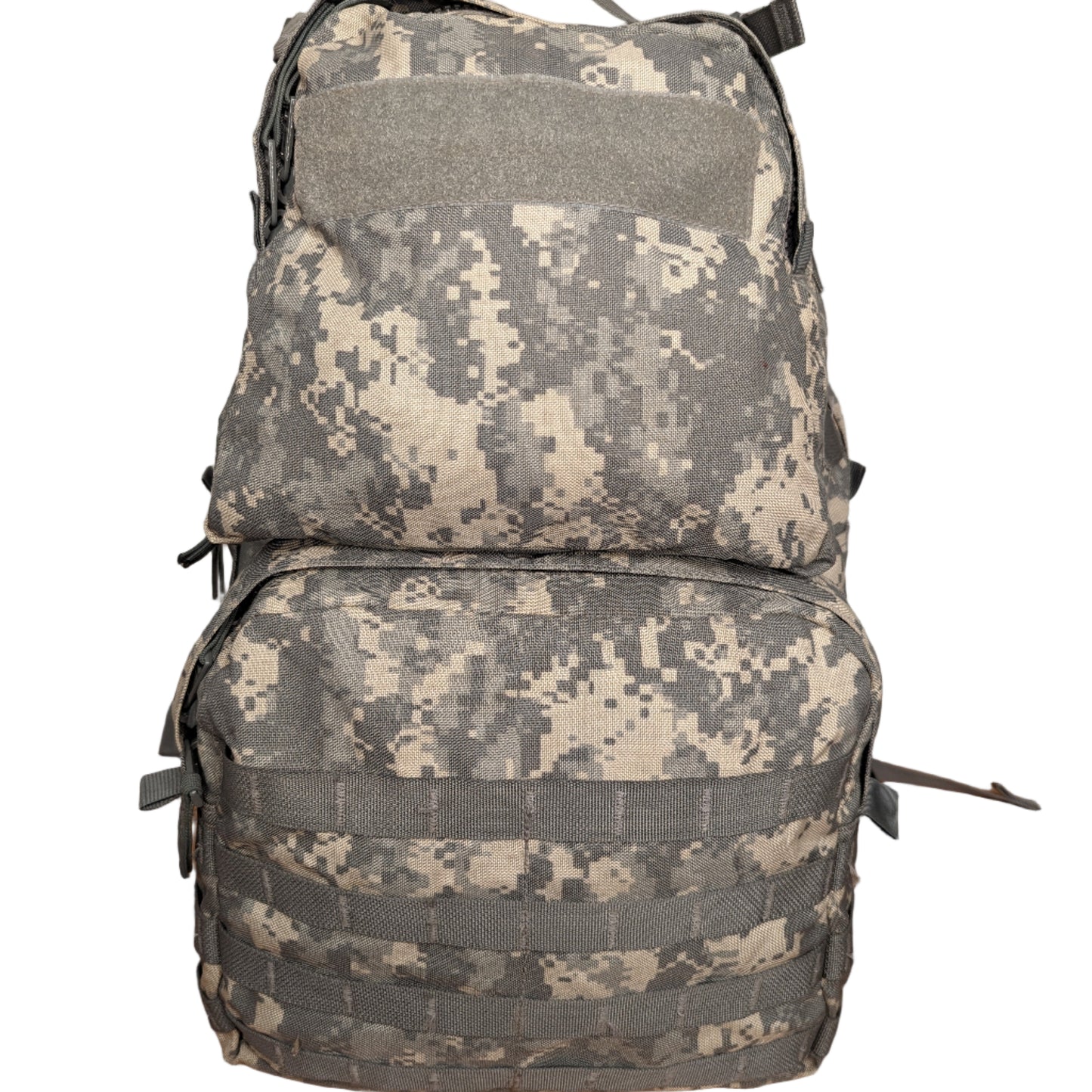 A front view of a U.S. Military Surplus Medium Field Pack in ACU digital camouflage, standing upright, featuring horizontal MOLLE webbing on both the upper and lower compartments and a large hook-and-loop patch field.