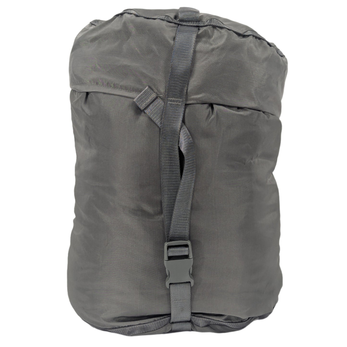 A small U.S. Military Surplus Compression Stuff Sack in foliage green, fully packed and tightly cinched with vertical and horizontal webbing straps and buckles, isolated on a white background.