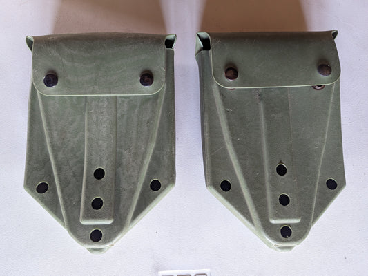 Two U.S. Military Surplus plastic entrenching tool carrier cases in olive drab green, laid side-by-side, featuring snap-button flap closures and a rugged molded design.