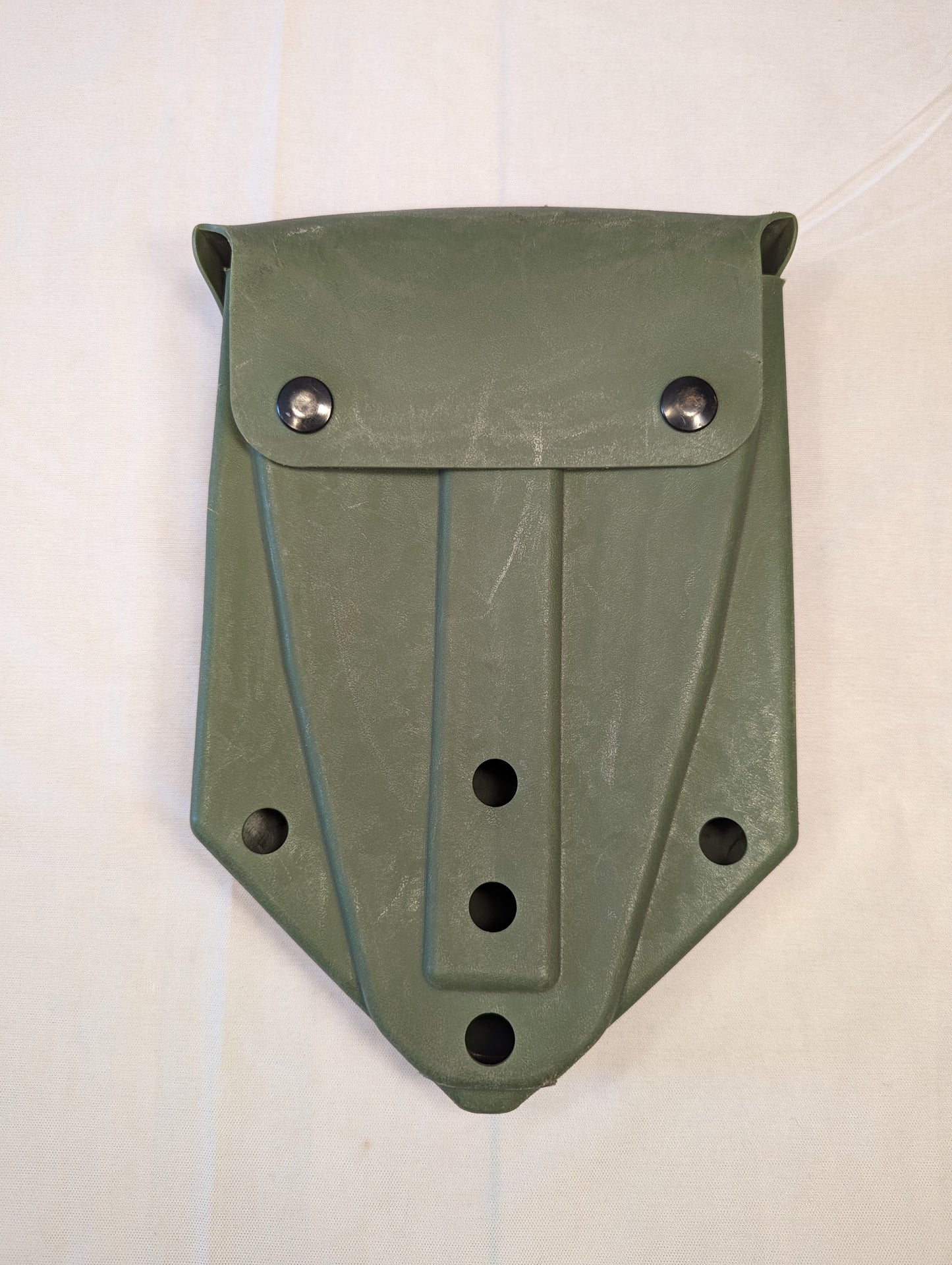 A single U.S. Military Surplus plastic entrenching tool carrier case in olive drab green, standing upright on a white background, featuring a snap-button flap closure and a rugged molded design.