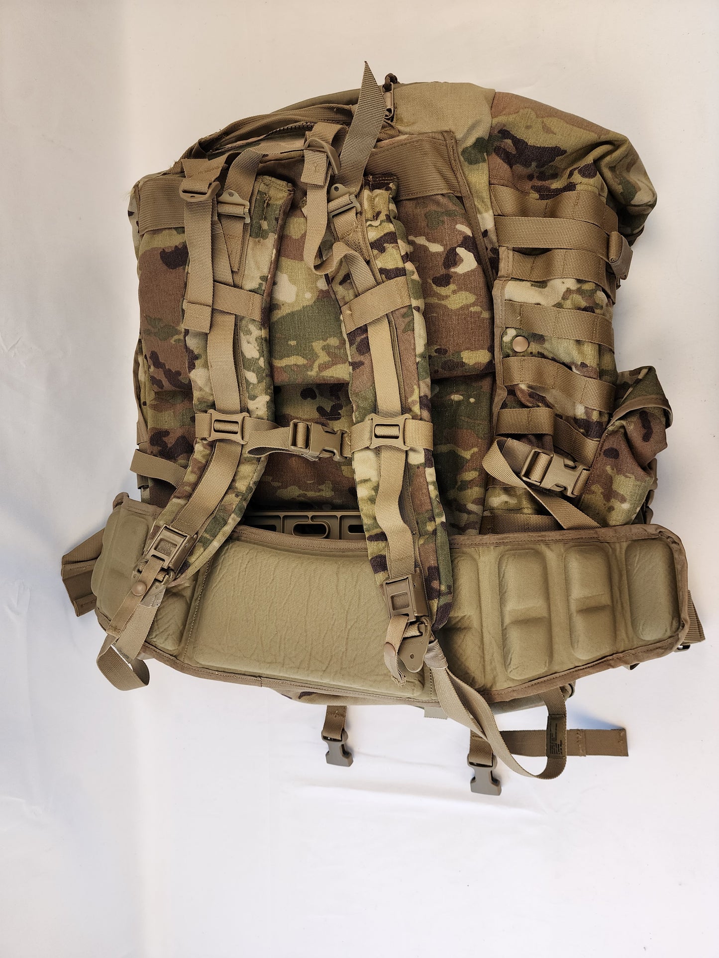 A large U.S. Military Surplus MOLLE 4000 Rucksack in OCP/Multicam camouflage, shown from the back, displaying the entire shoulder harness, frame, and padded hip belt.
