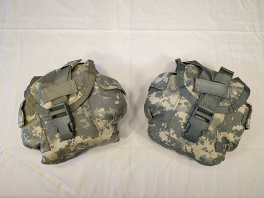 Two U.S. Military Surplus MOLLE II 1-Quart Canteen/General Purpose Pouches in ACU digital camouflage, laid side-by-side on a white background, featuring flap closures secured by large black quick-release buckles.